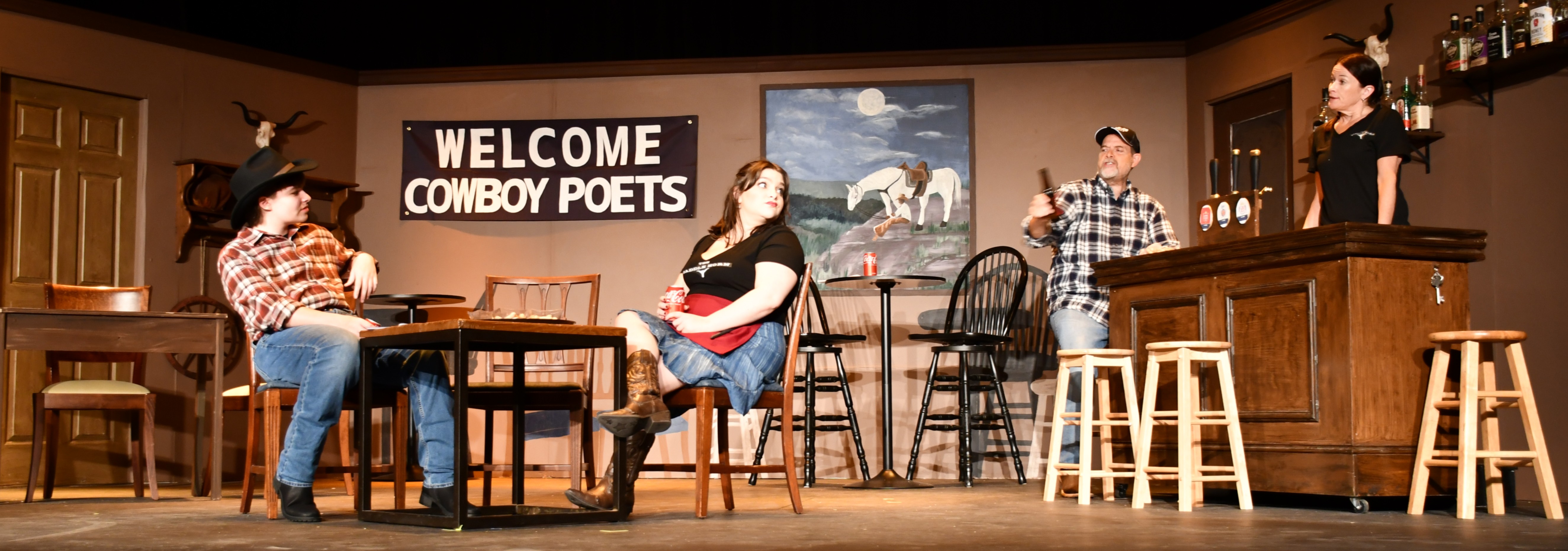 Actors in a saloon on stage