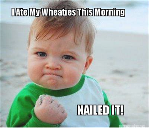 Small triumphant child on a beach with 